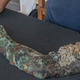 A sediment-encrusted bronze arm recovered from the Antikythera wreck. (Brett Seymour/EUA/ARGO 2017)